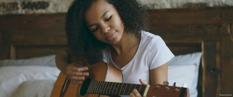 African American Female writing music